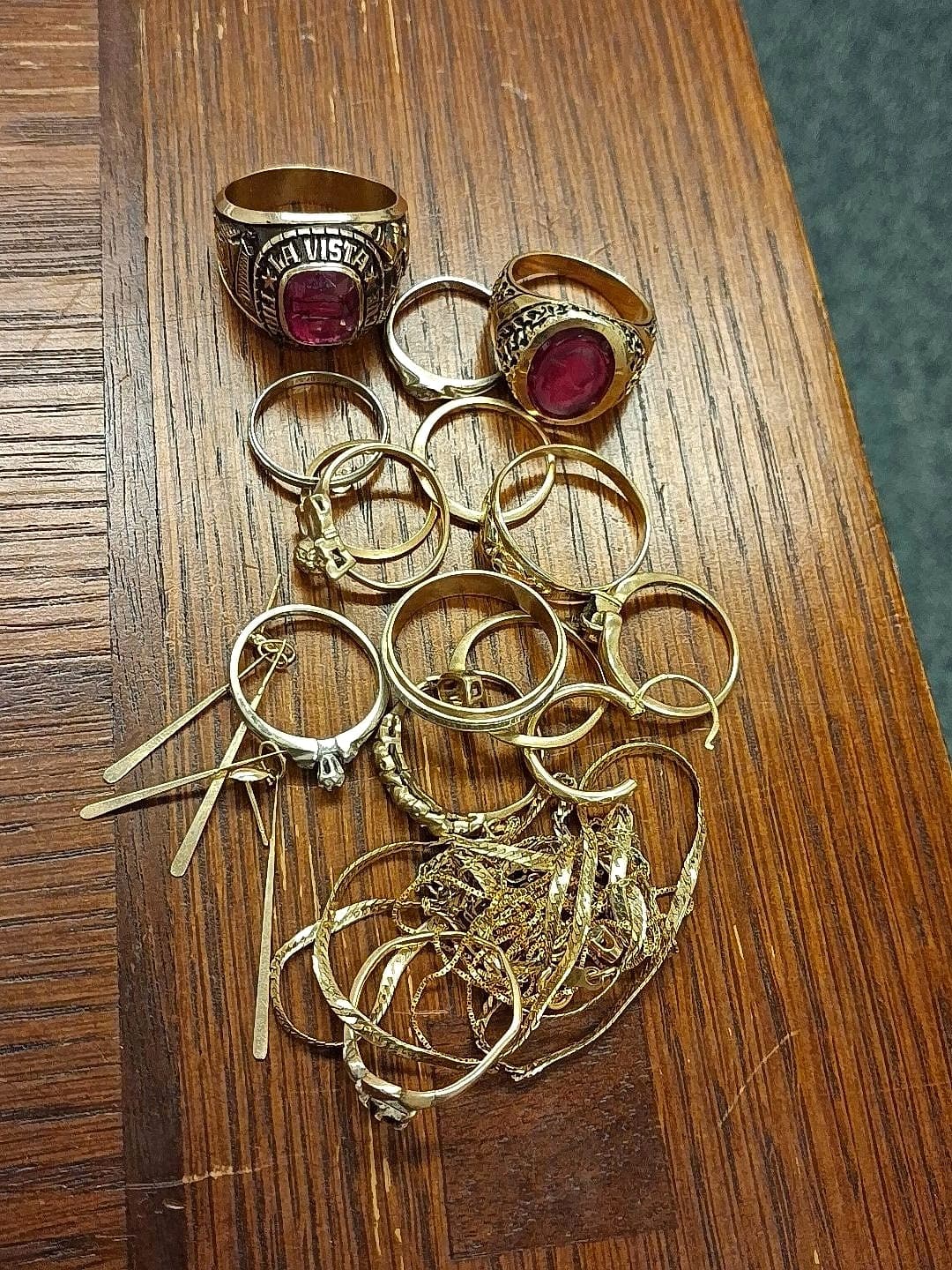 Gold rings, chains, and earrings weighed and priced at a private appointment