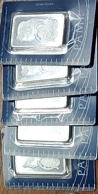 Sealed PAMP fine silver bars from a bullion purchase